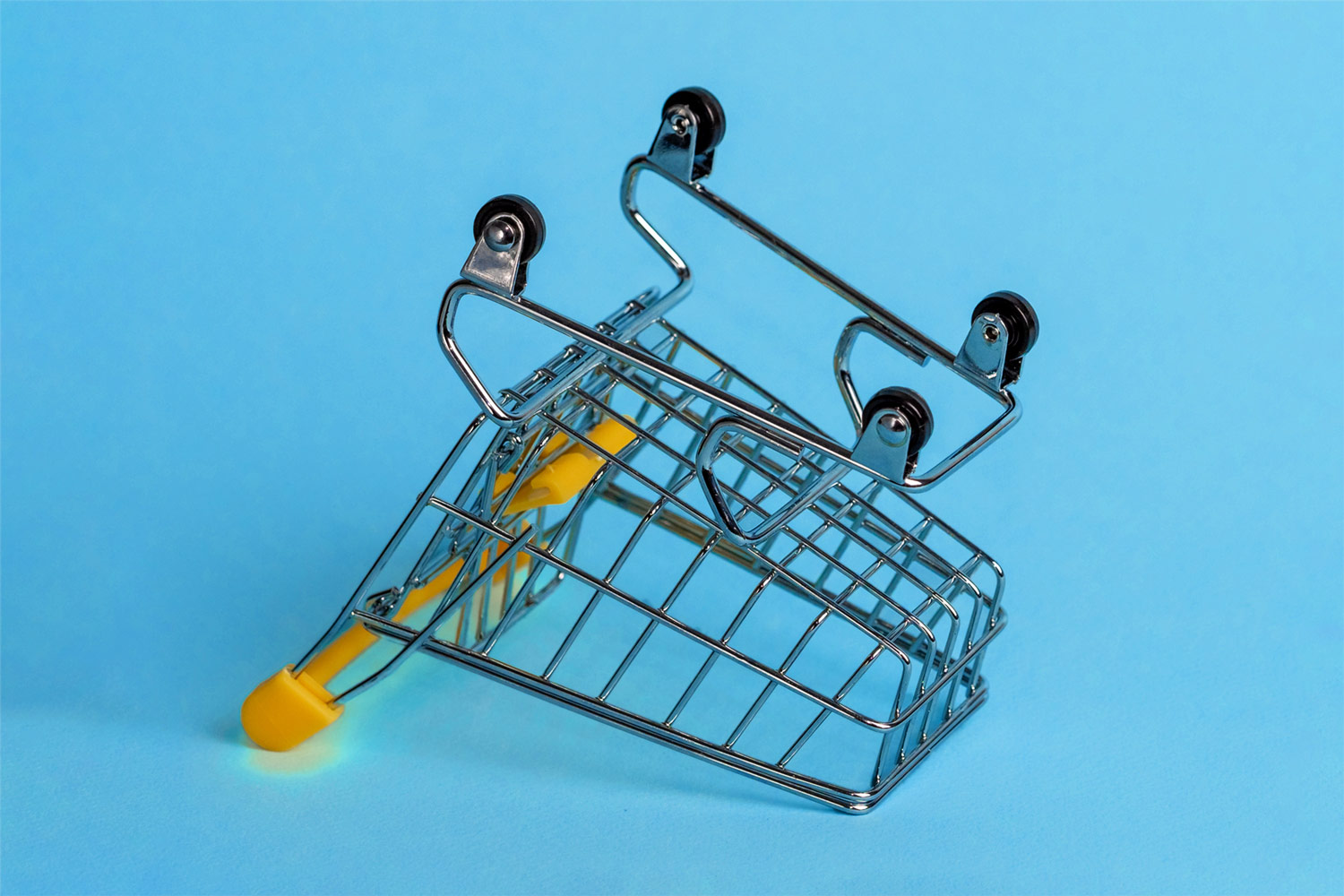 Shopping cart lying upside down