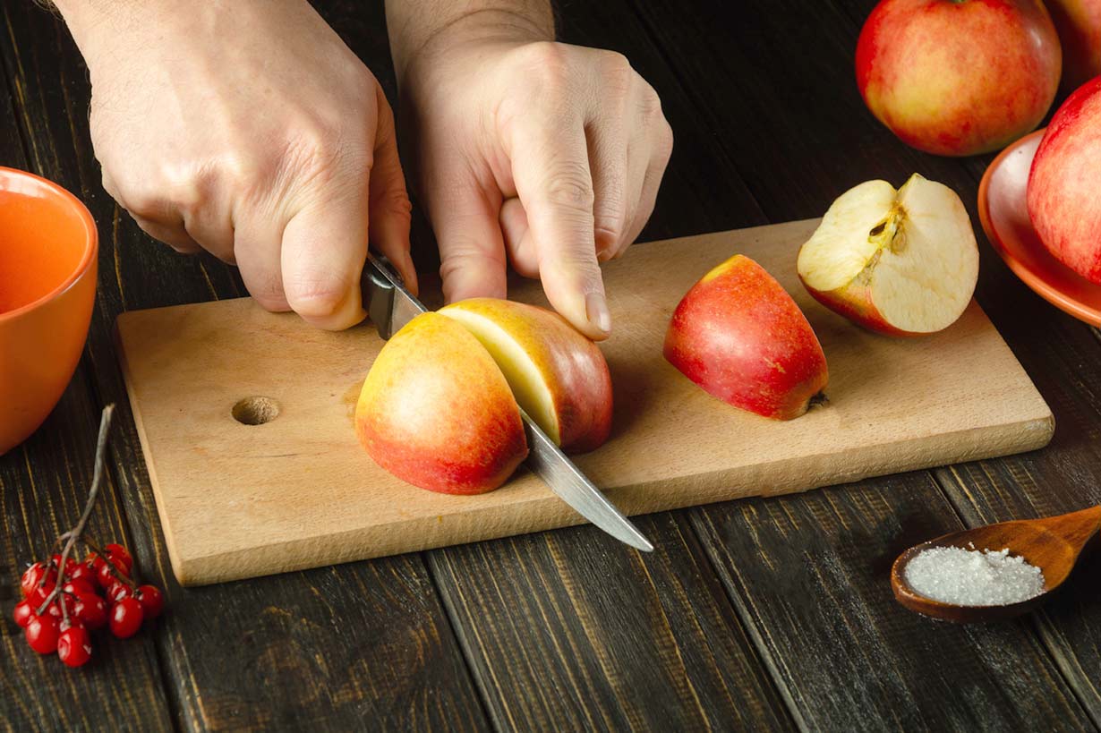 Man slicing apples